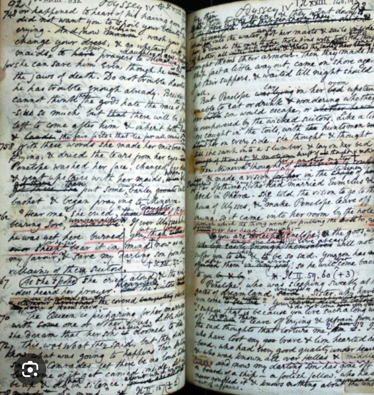 Open book with densely written handwriting and annotations, including underlines and corrections in different colors.